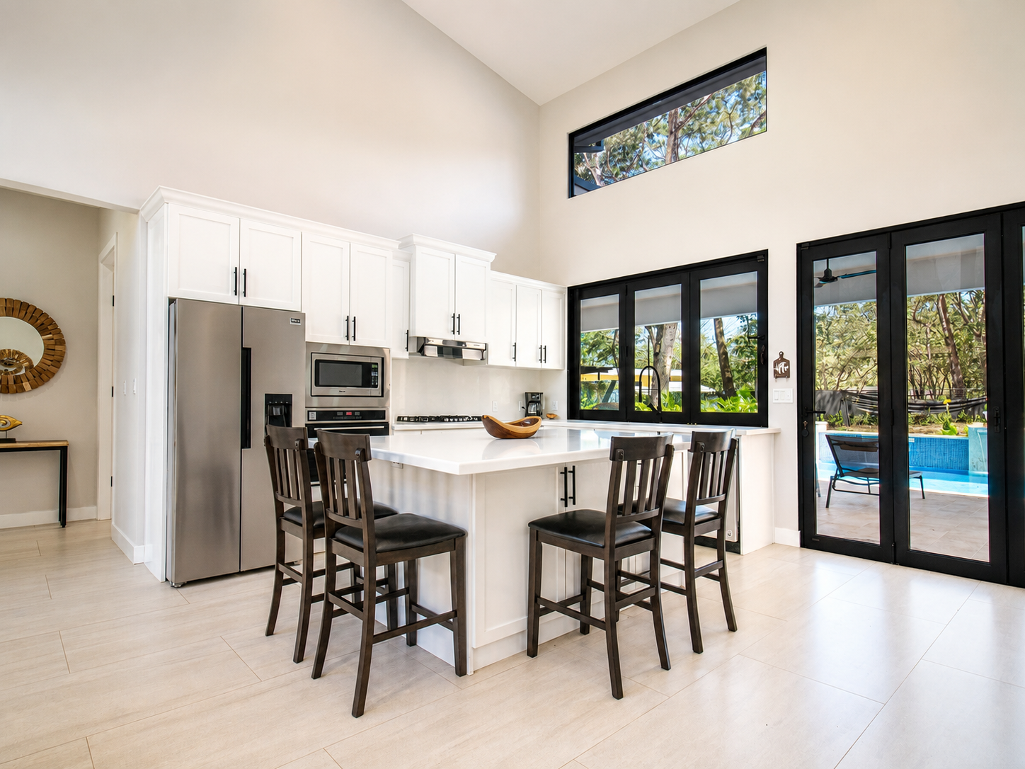 Casa Tranquila kitchen with island and wood cabinetry